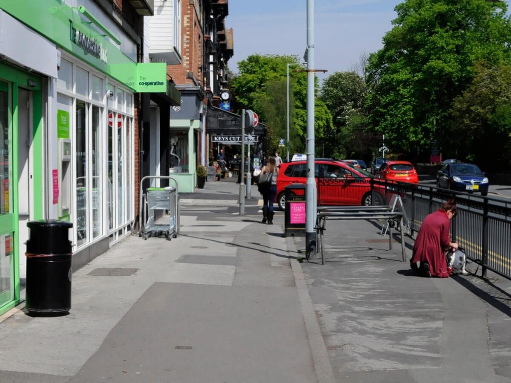 View of Heaton Moor Road, outside of the Co-op before pavement upgrade.