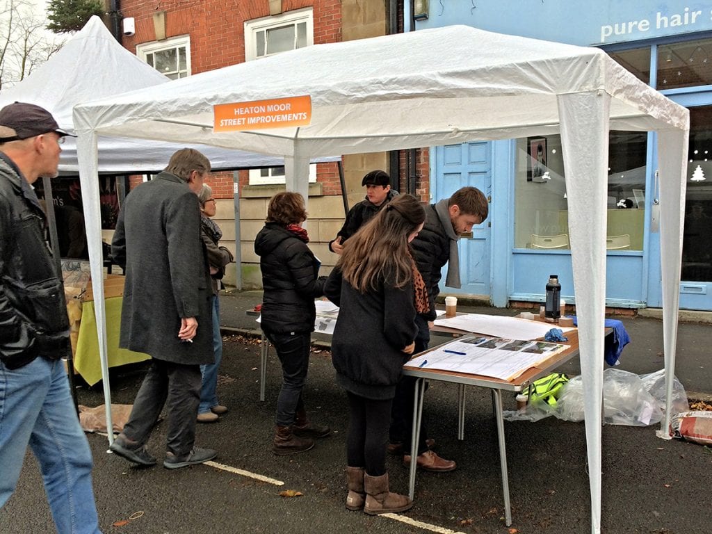 Nicholas Atherton of Natural Dimensions undertaking in community consultation for Shaw Road improvements in a tent