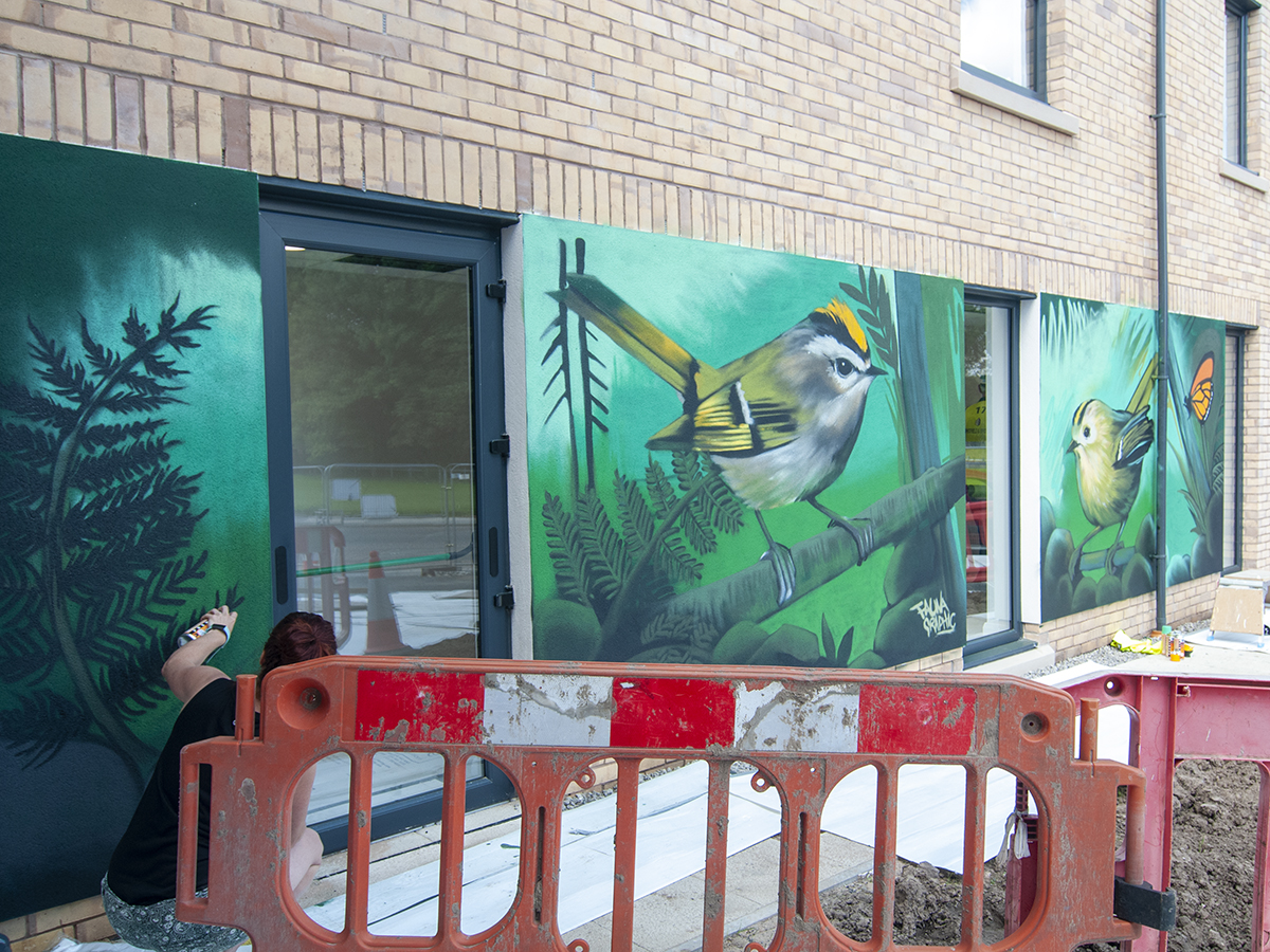 painted mural of goldfinch