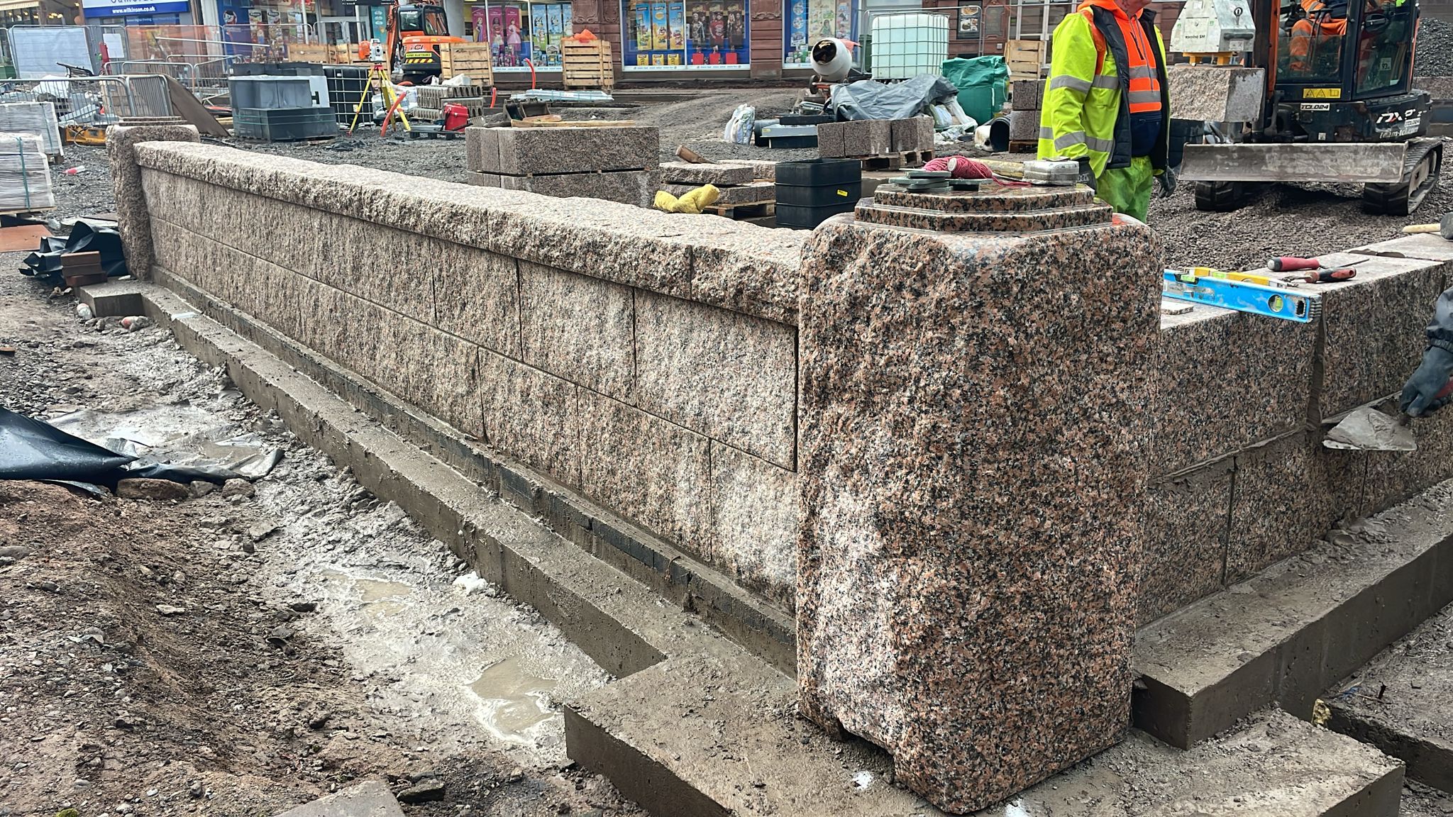 pink granite cropped stone wall pier and copings